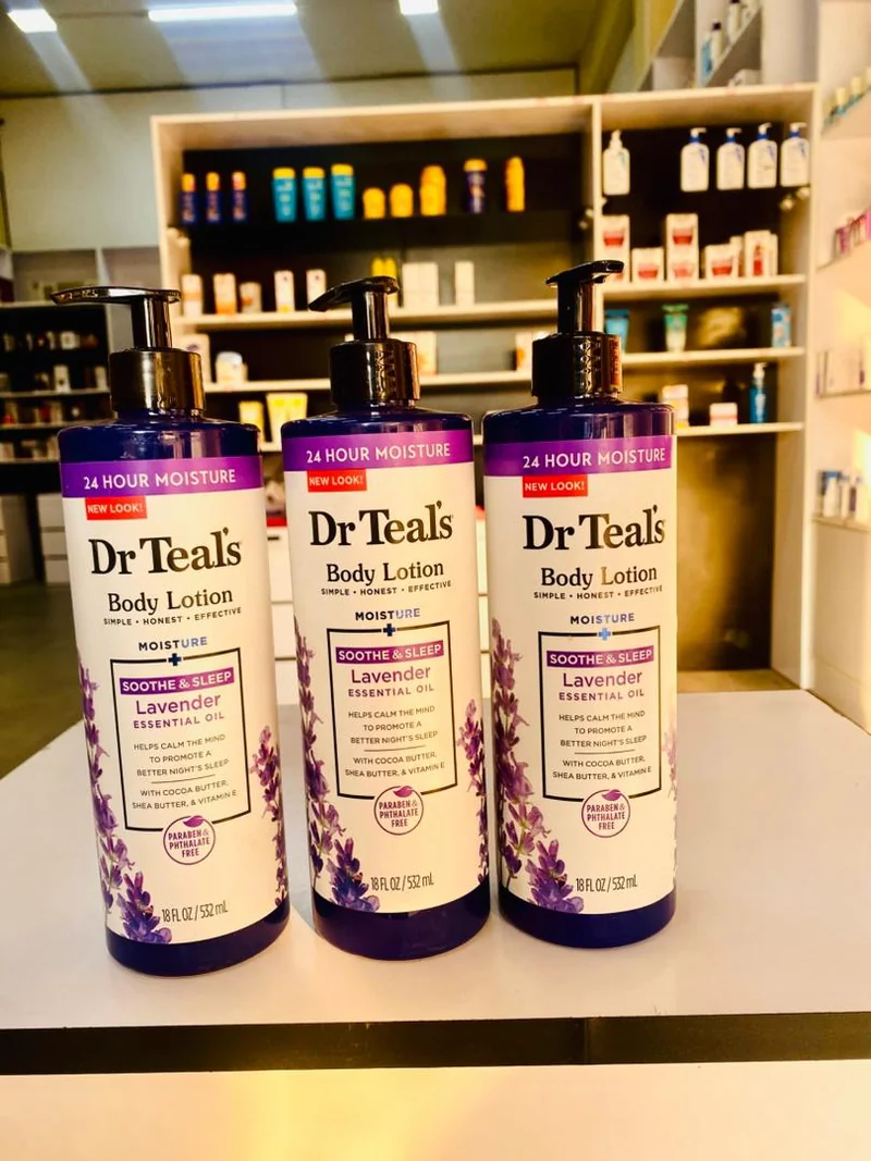 Three Dr Teal’s lavender body lotion pump bottles labeled 532 mL