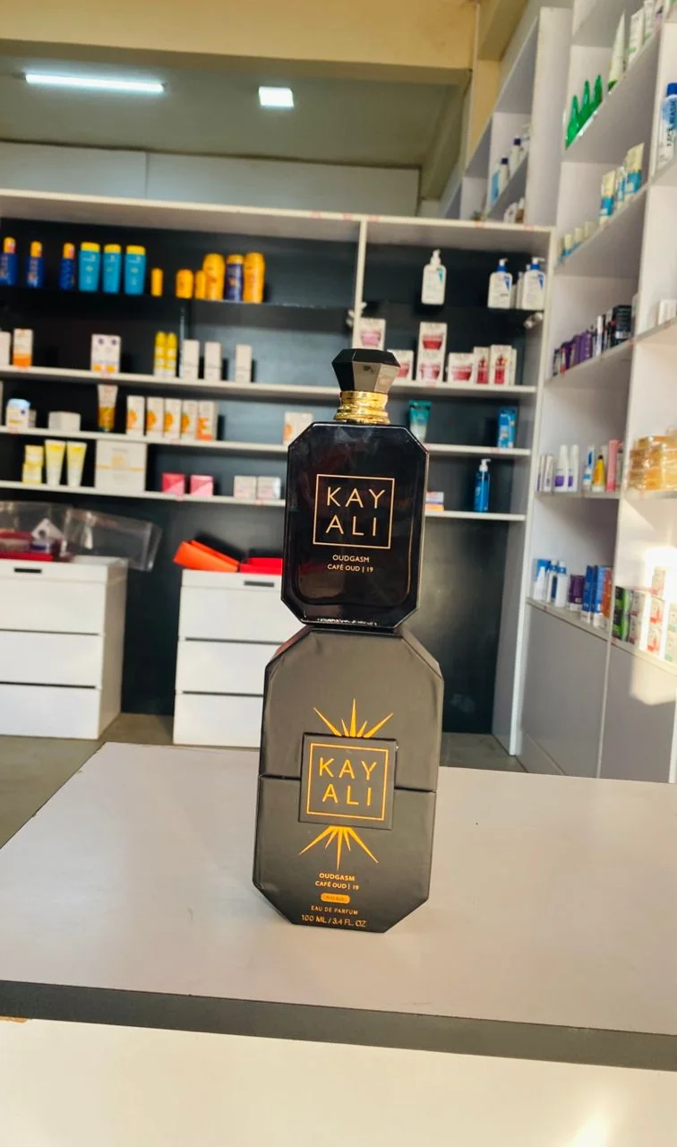 Dark faceted bottle with gold lettering and matching dark box — KAYALI Oudgasm Café Oud | 19