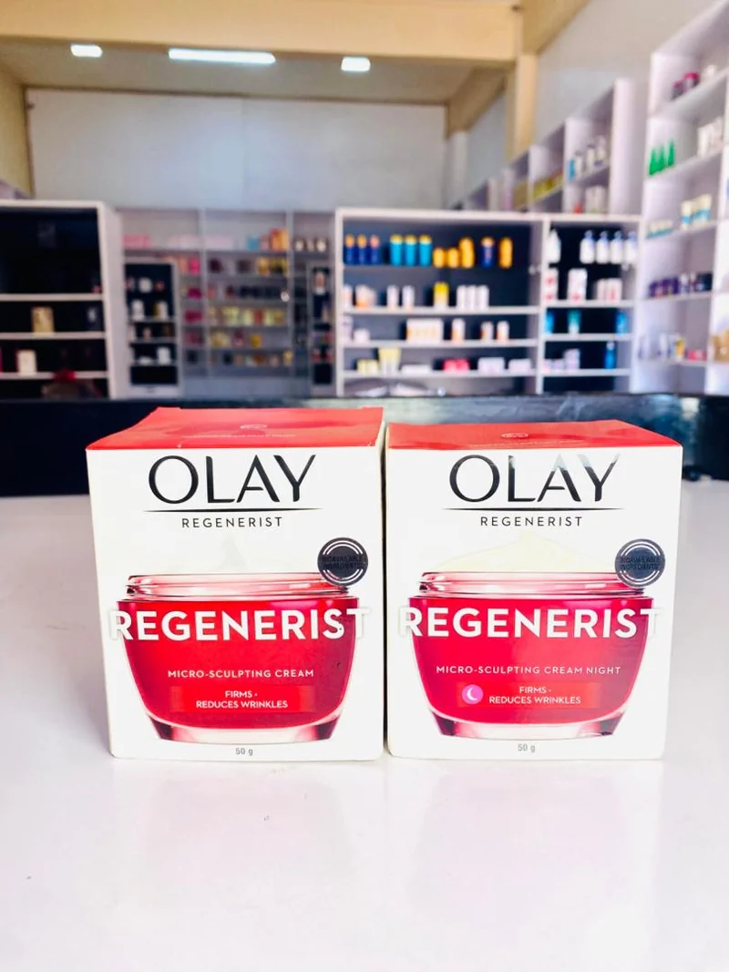 Two OLAY Regenerist cream boxes, standard and night versions, marked 50 g